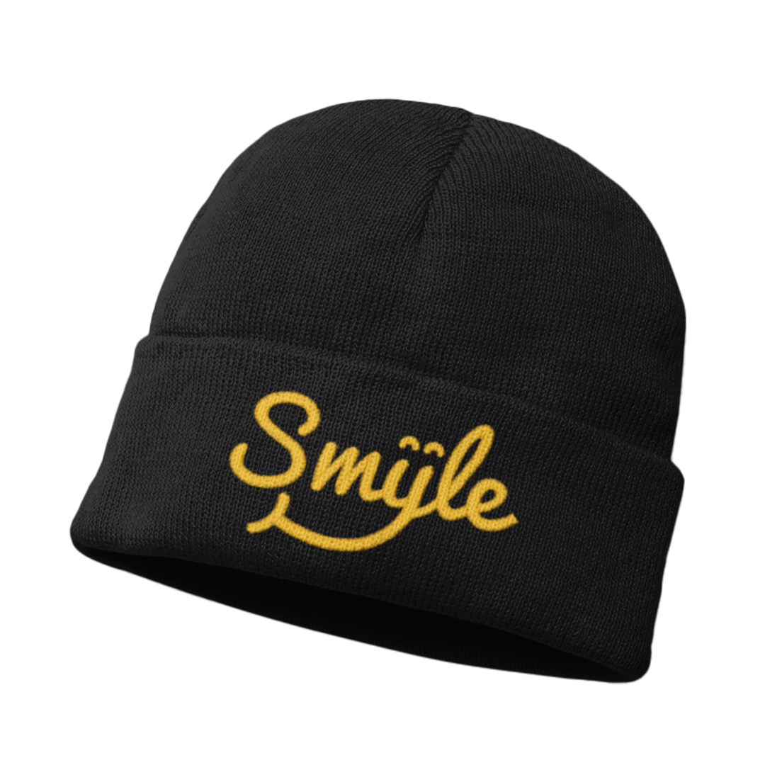 a black beanie with a Smyle™ embroidered on it